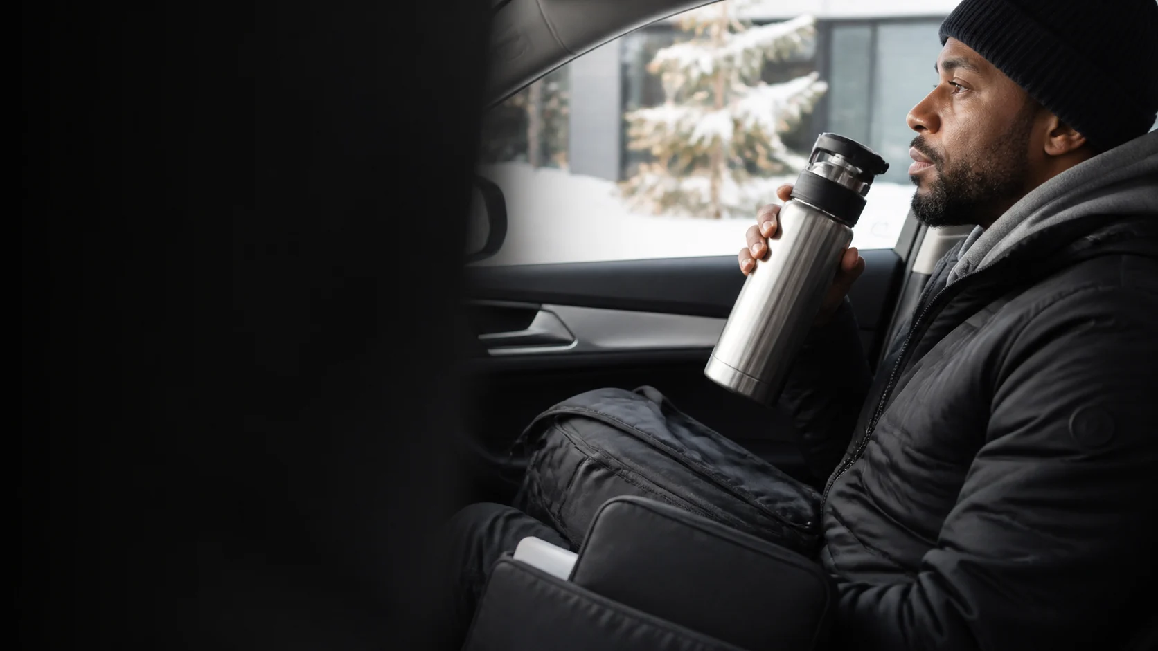 Representative insulated water bottle carried during a winter commute