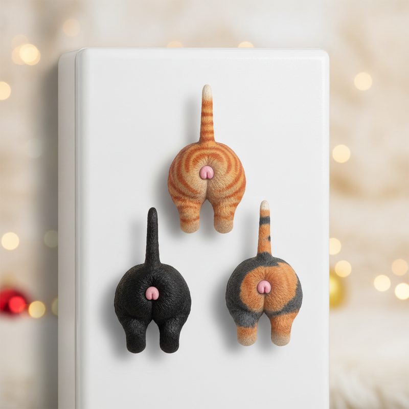 Representative set of cat rear-end magnets arranged on a fridge door