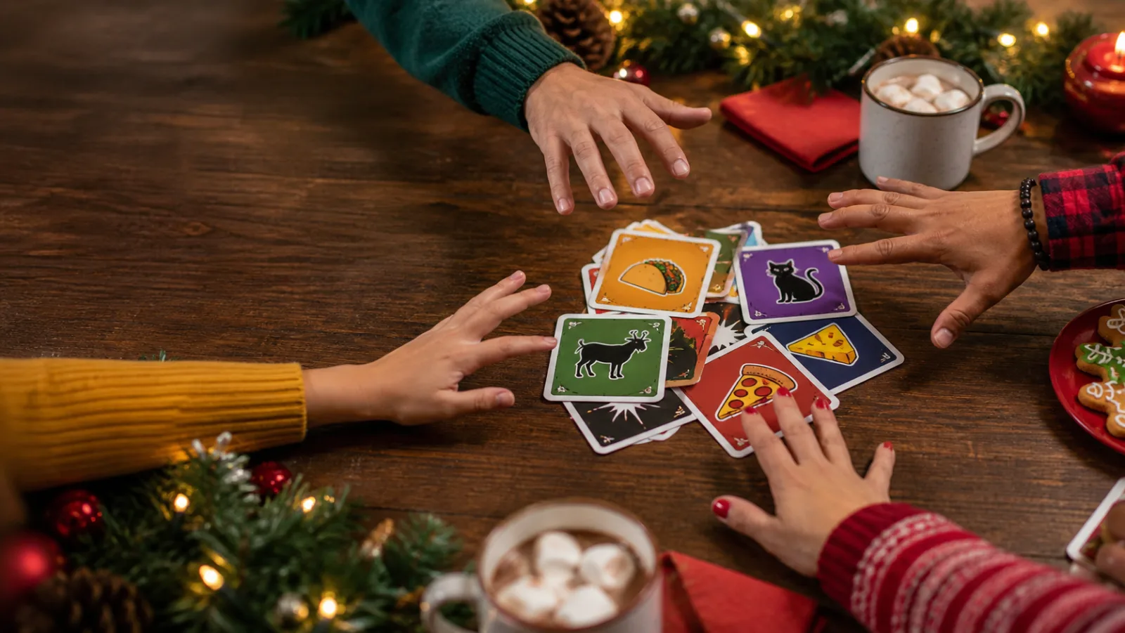 Representative illustrated party cards and several hands poised over a festive table