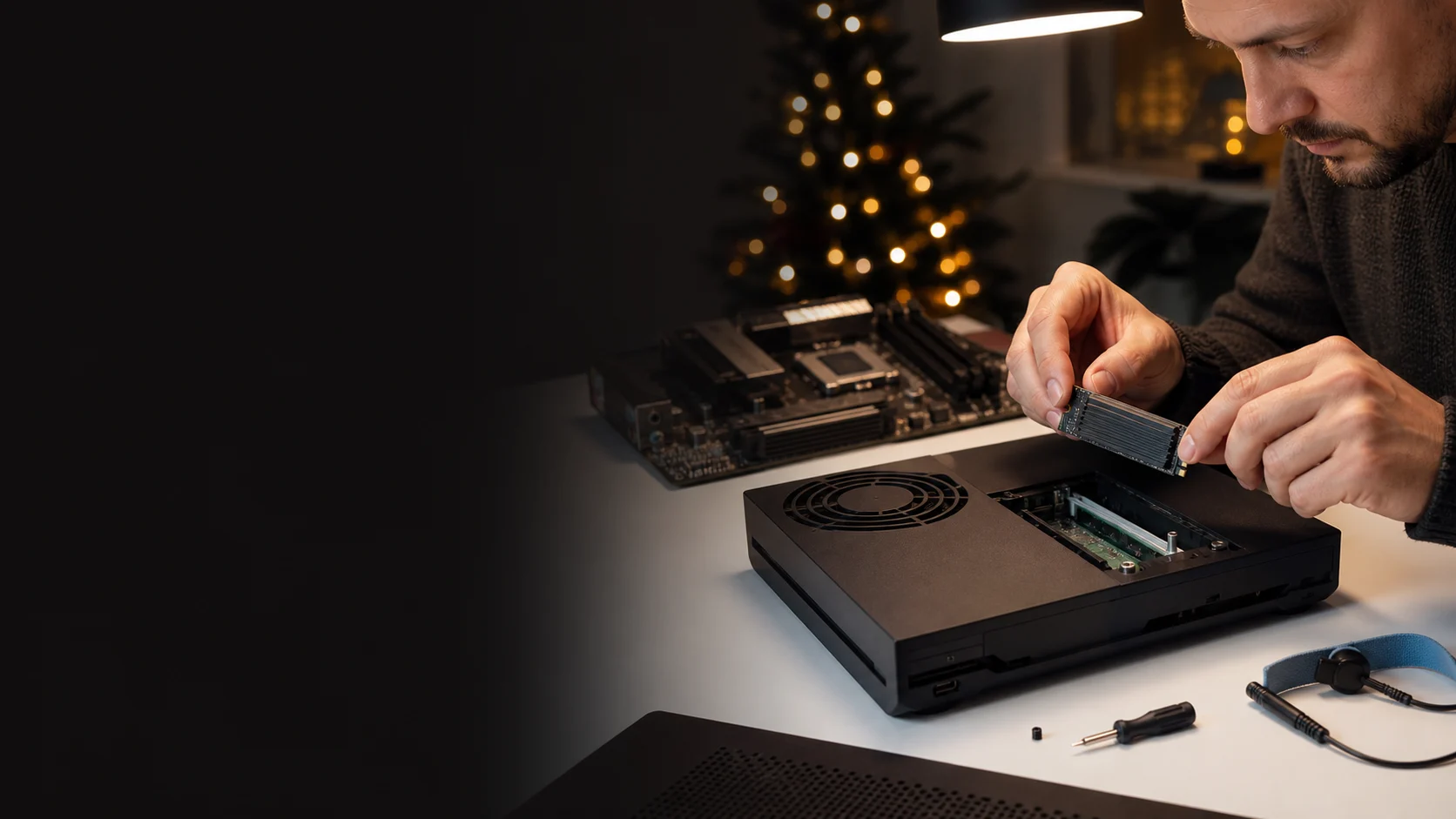 Representative person installing a generic heatsink-equipped M.2 SSD in a game console